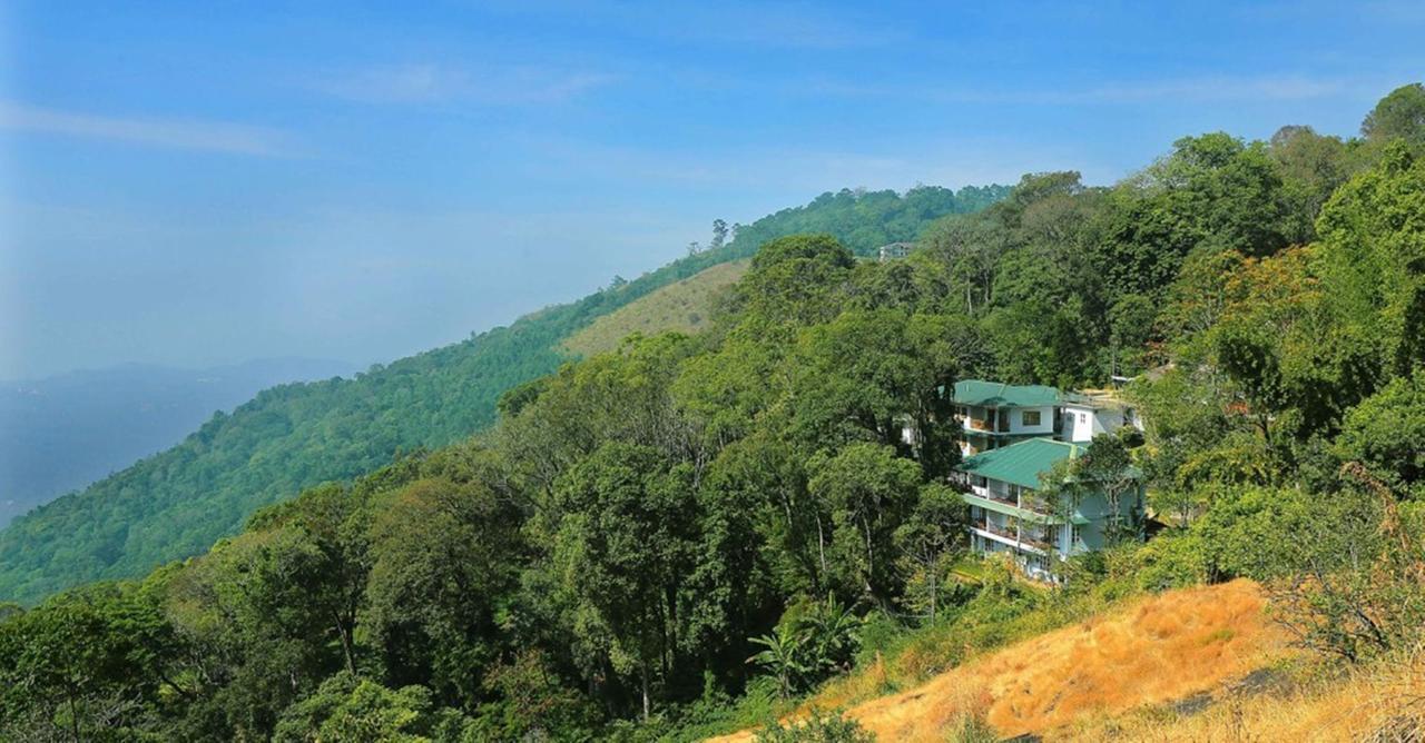 อีเกิล เมาน์เท็น รีสอร์ต มุนนาร์ Bed & Breakfast ภายนอก รูปภาพ